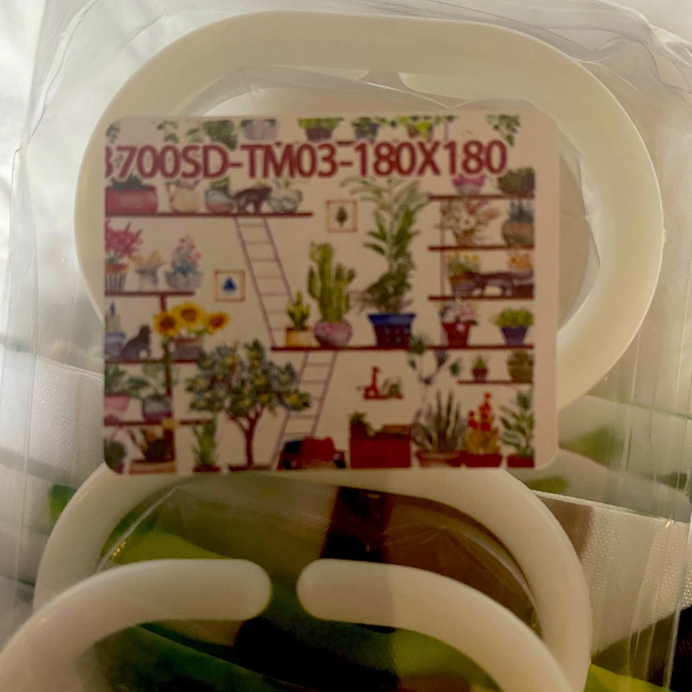 Brand new shower curtain with hooks